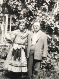 Father Josef Barton with daughter Adela in front of grandmother Marie Podzimkova's house, end of World War II