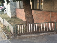 The rusty fence behind which samples of the factory's products were originally displayed.