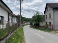 The school in Čierná Lehota today (left), the house of the Kašičkovs stands opposite