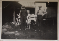 Rudolf Hegner and his oldest son in a wheelwright shop