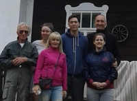 Petr Polakovič (top right) in front of their former family homestead in Janov Dol, before 2020