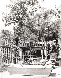 Alena Štěpánková Veselá with her brother Karel and nanny Lojzi in 1925