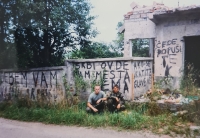 Ruins of a devastated house with inscriptions, Jan Svoboda, first left, Bosnia and Herzegovina, 1999