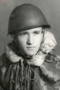 As a soldier in a military helmet, c. 1954