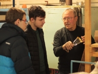 Václav Kuželka with students in his workshop