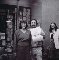 Bronislava Volková, left, in front of the Čapek Brothers Bookshop, Prague, 1989