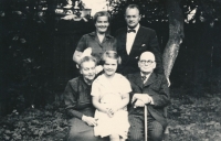 With grandfather Zdeněk Kamper and grandmother Edita in Mladá Boleslav, parents in the background, first half of the 1950s