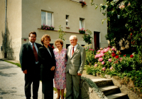 Rudolf Krivanek, son Stepan and their wives in front of their house, 1990