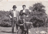 Václav Bradáč escorts his brother Alois, who is about to do compulsory military service in the Romanian army. The musician Josef Merhaut plays for them, Gernik, 1966