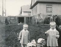 Jarmila Šrámková with her twin sister Věra in front of their house in Roztoky u Jilemnice, 1930