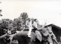 Jiří Lukš in the middle on the back of an elephant, Laos, 1985