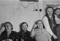 Mother (centre) with neighbours, apparently after the war