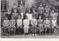 Photographs from the school years of the Hostinné Primary School, the witness is in the first row on the far right