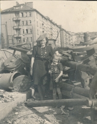 Blanka Lanštiaková with her mother Milada Vackova in front of the barricade, Prague, 1945