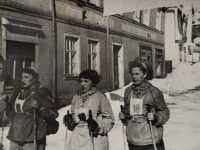 Ladislav Žák's mother on skis, wearing the number 18