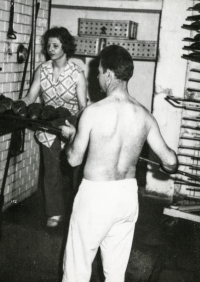 Arnošt Obrusník in 1975 while planting bread into the oven in the bakery in Vrbno pod Pradědem