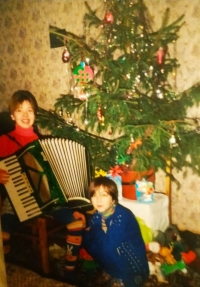 At the New Year tree with a button accordion, Pechory, 1999