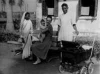 Mother holding the witness, left nanny Aja, right servant, Batanagar, India, 1949