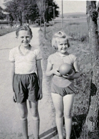 With her brother Kamil, late 1950s.