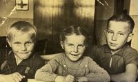 Ludmila Holbová in the first grade of primary school with her brother Václav (third grade) and brother Stanislav (fifth grade)