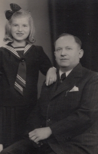 With her father, 1940