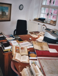 Jaroslav Douša's office with documents prepared for visiting students at the Plzeň City Archive, 2007