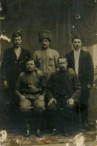 Viacheslav Babak's grandfather, Ivan, seated (left) with his comrades during the Soviet-Finnish war 