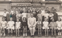 Stanislava Petrželková in the second class of the municipal school in Holešov, first row, third from the right