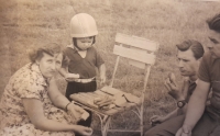 Rudolf Průcha in helmet, with his mother, father (far right) and friend