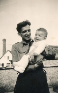 With his father; 1948