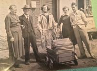 Ludmila Kubíčková's parents, sister-in-law with her daughter in a pram and Mrs. Kubíčková with her husband in front of her parents' house in Hluboš